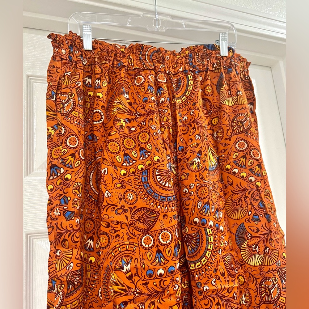 Anthropologie Wide-Leg Pants in Vibrant Orange Paisley Print